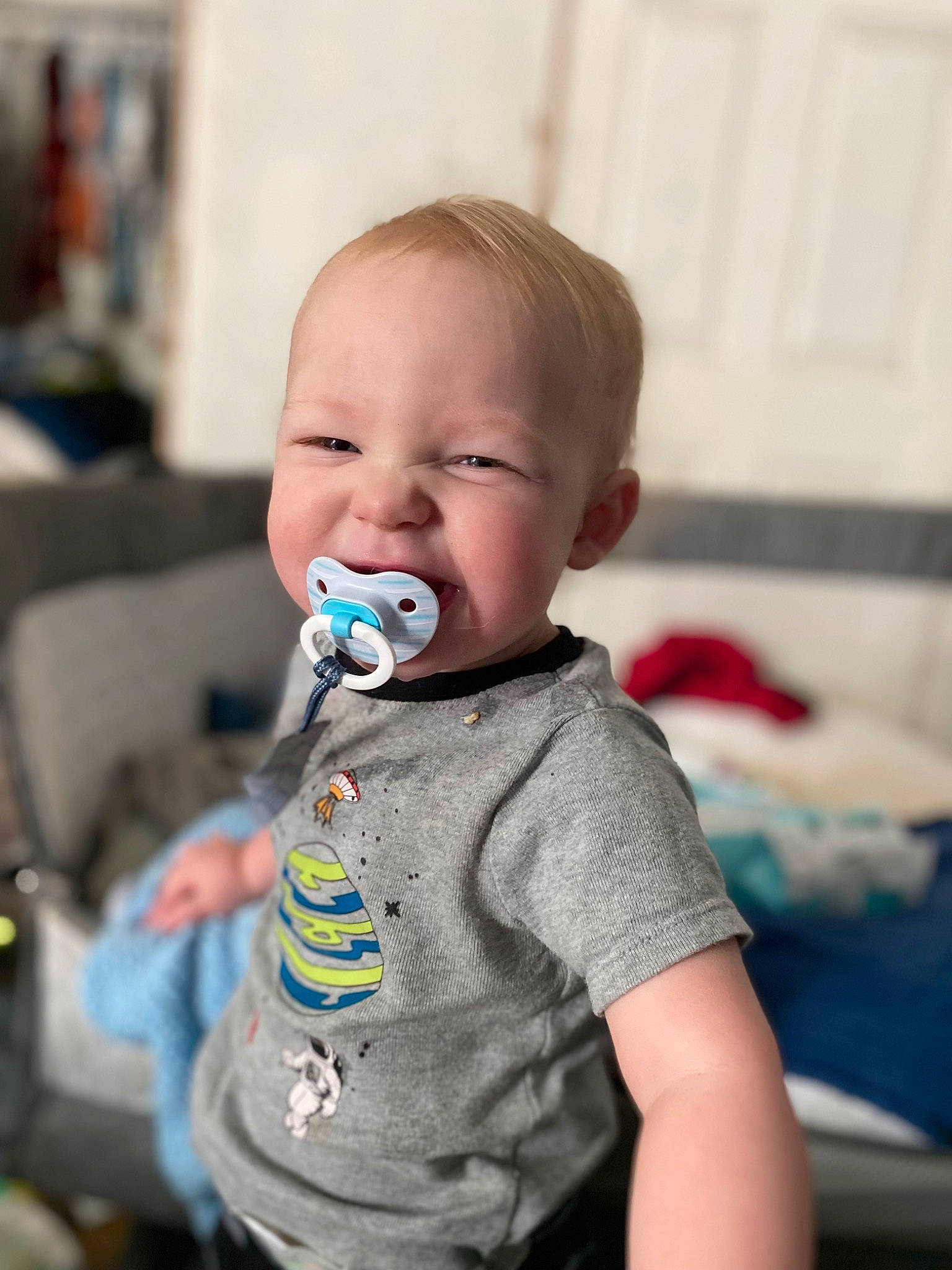 Gavin joined the competition — help win amazing prizes! baby, baby_toddler_clothing, cheek, child, comfort, face, fun, happy, iris, laugh, pattern, person, play, portrait_photography, sitting, sleeve, smile, t_shirt, toddler