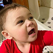 Autumn is registered to the contest to win money with this photo: toddler, child, face, expression, red_shirt, indoor, bathroom, bathtub, tile_floor, person, cute, young_child, skin, hair, mouth_open, looking_away, closeup, home, casual, portrait