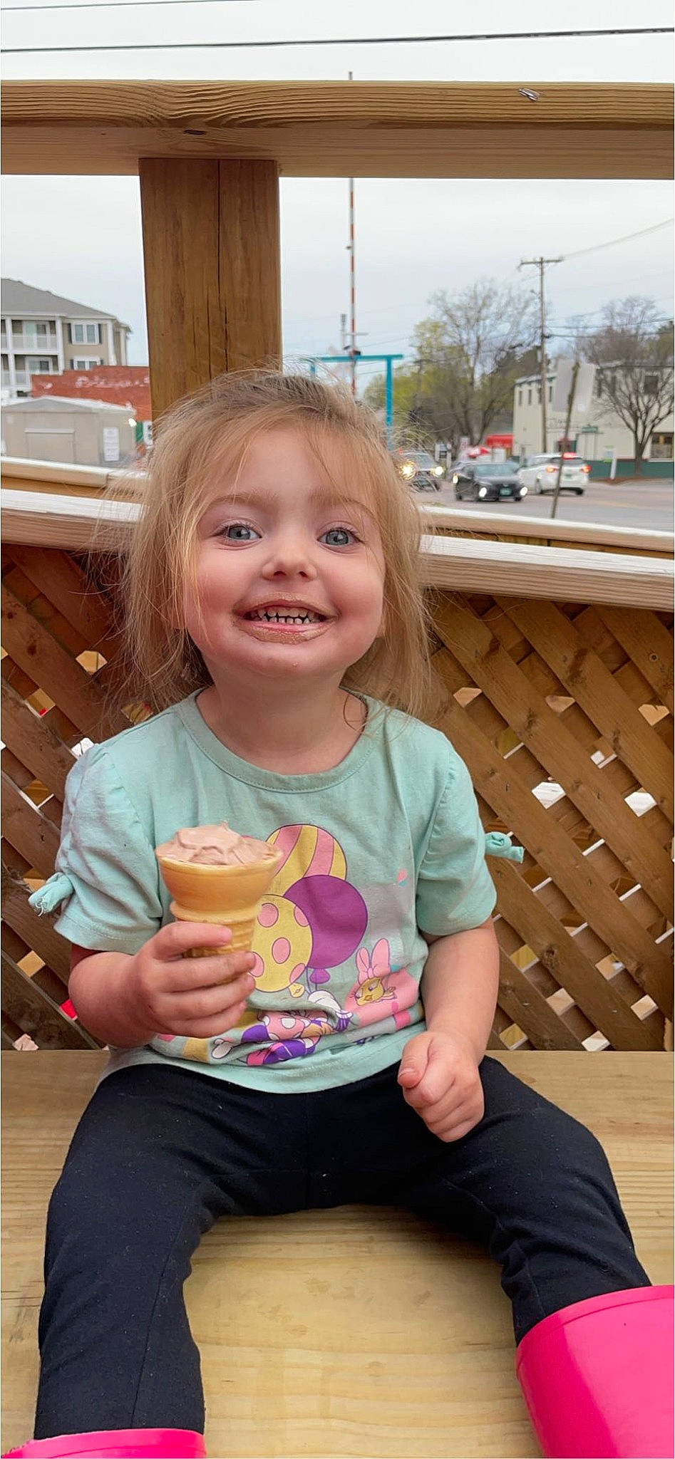 Ayrabella is registered to the contest to win money with this photo: baby_toddler_clothing, blond, child, dessert, facial_expression, finger, food, fun, happy, joy, leisure, person, pink, sitting, skin, smile, standing, sweetness, t_shirt, tableware