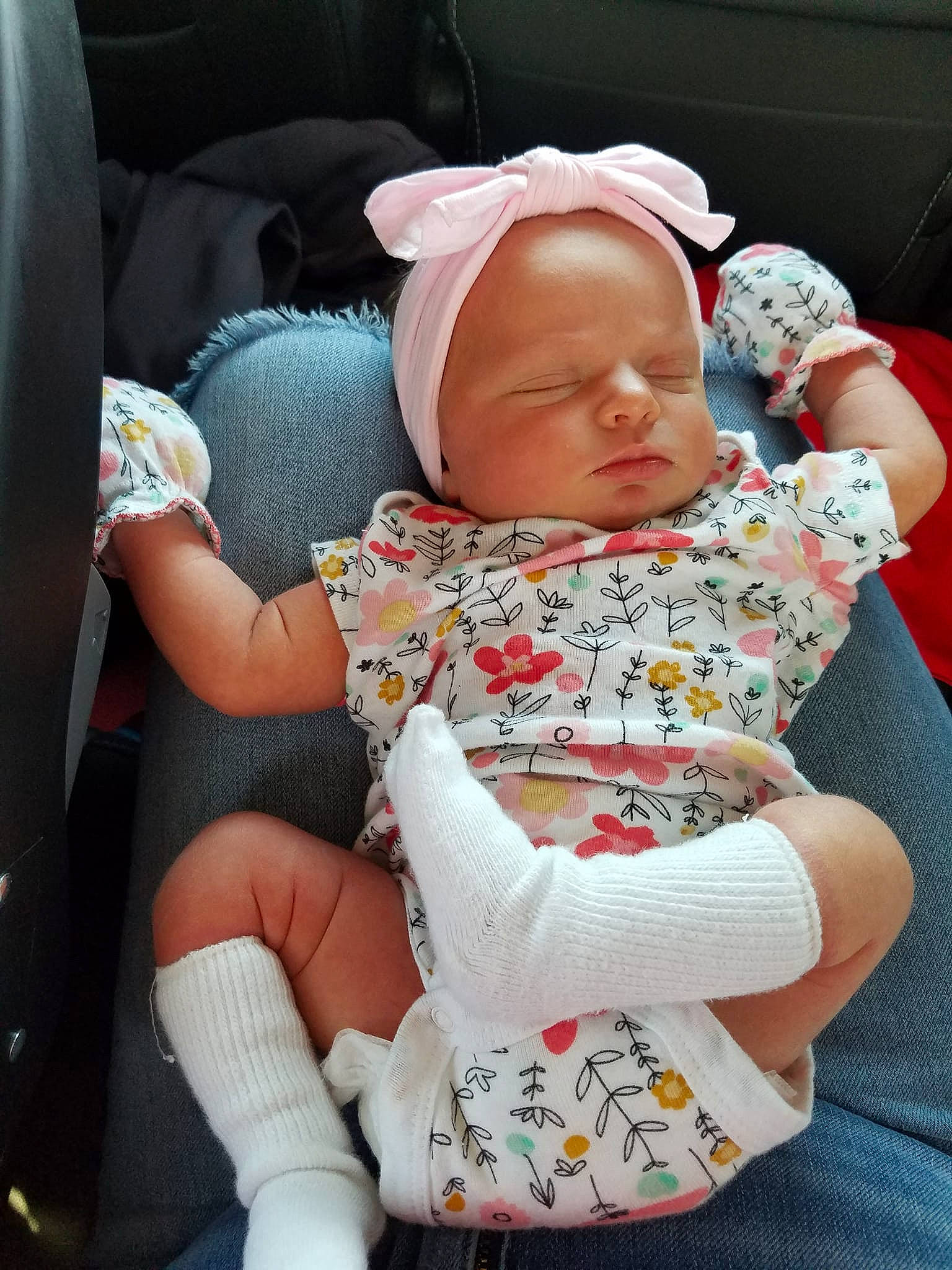 Brittany Luray is registered to the contest to win money with this photo: baby, baby_products, baby_sleeping, baby_toddler_clothing, carmine, cheek, child, comfort, finger, hand, human_leg, lap, leg, mouth, pattern, person, sitting, sock, thigh, toddler