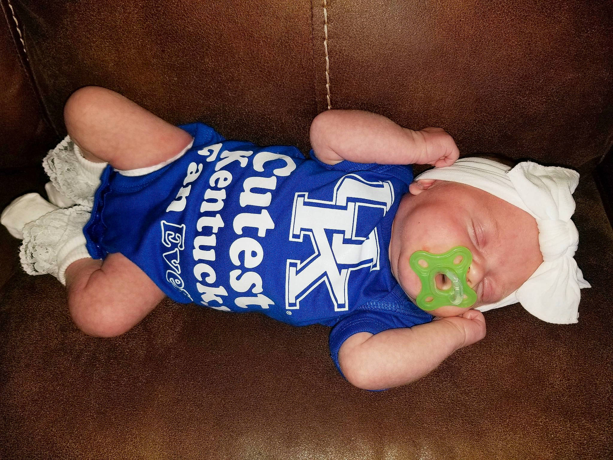 Brittany Luray is registered to the contest to win money with this photo: baby, baby_toddler_clothing, elbow, electric_blue, finger, foot, hand, head, human_body, human_leg, jersey, knee, nail, person, sleeve, sportswear, thigh, thumb, toddler, waist