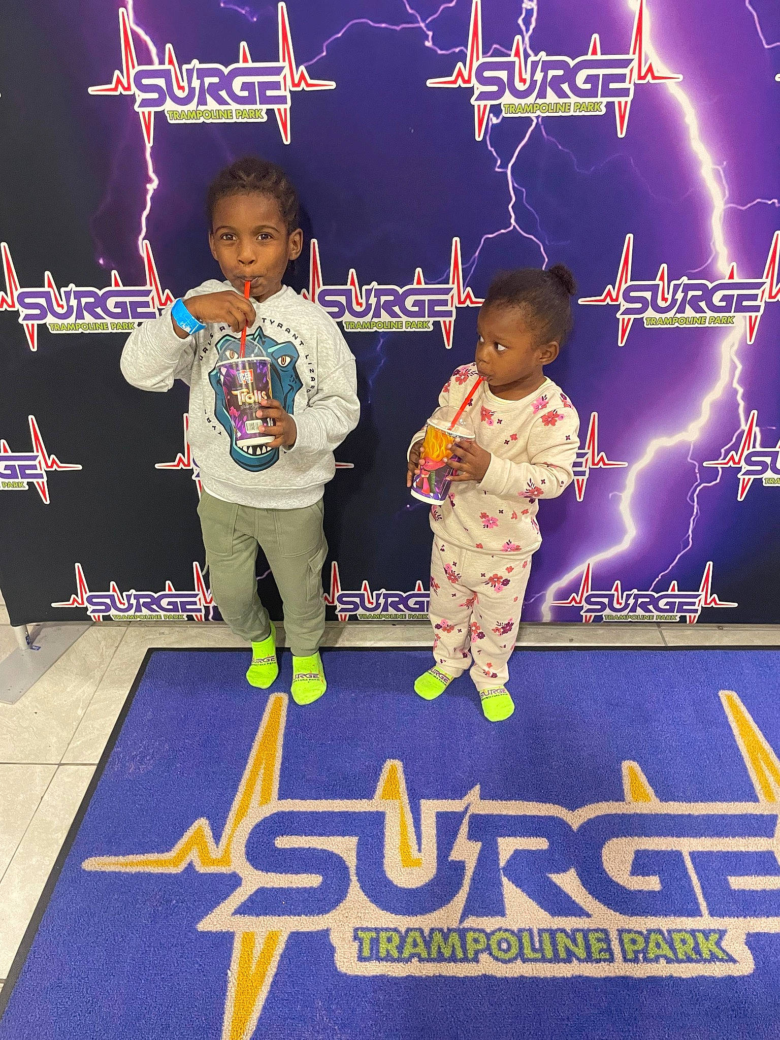 Aliana is registered to the contest to win money with this photo: advertising, book, child, electric_blue, event, flooring, font, happy, illustration, light, lightning, logo, person, photo_caption, poster, publication, space, t_shirt, thunder, toddler