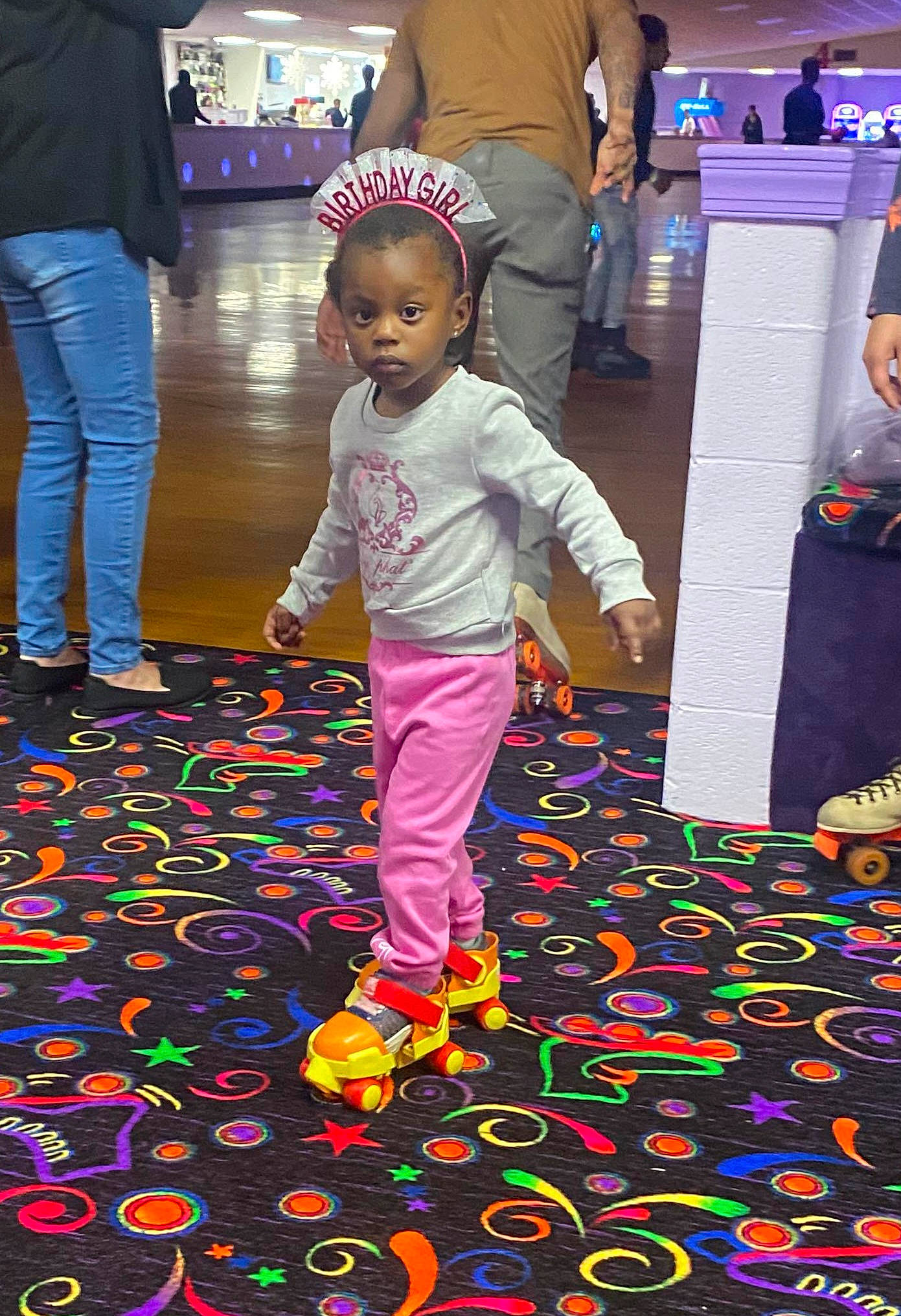 Aliana is registered to the contest to win money with this photo: beauty, black, carpet, child, event, floor, flooring, fun, happy, leisure, luggage_and_bags, magenta, people_in_nature, person, play, purple, red, shoe, snapshot, standing