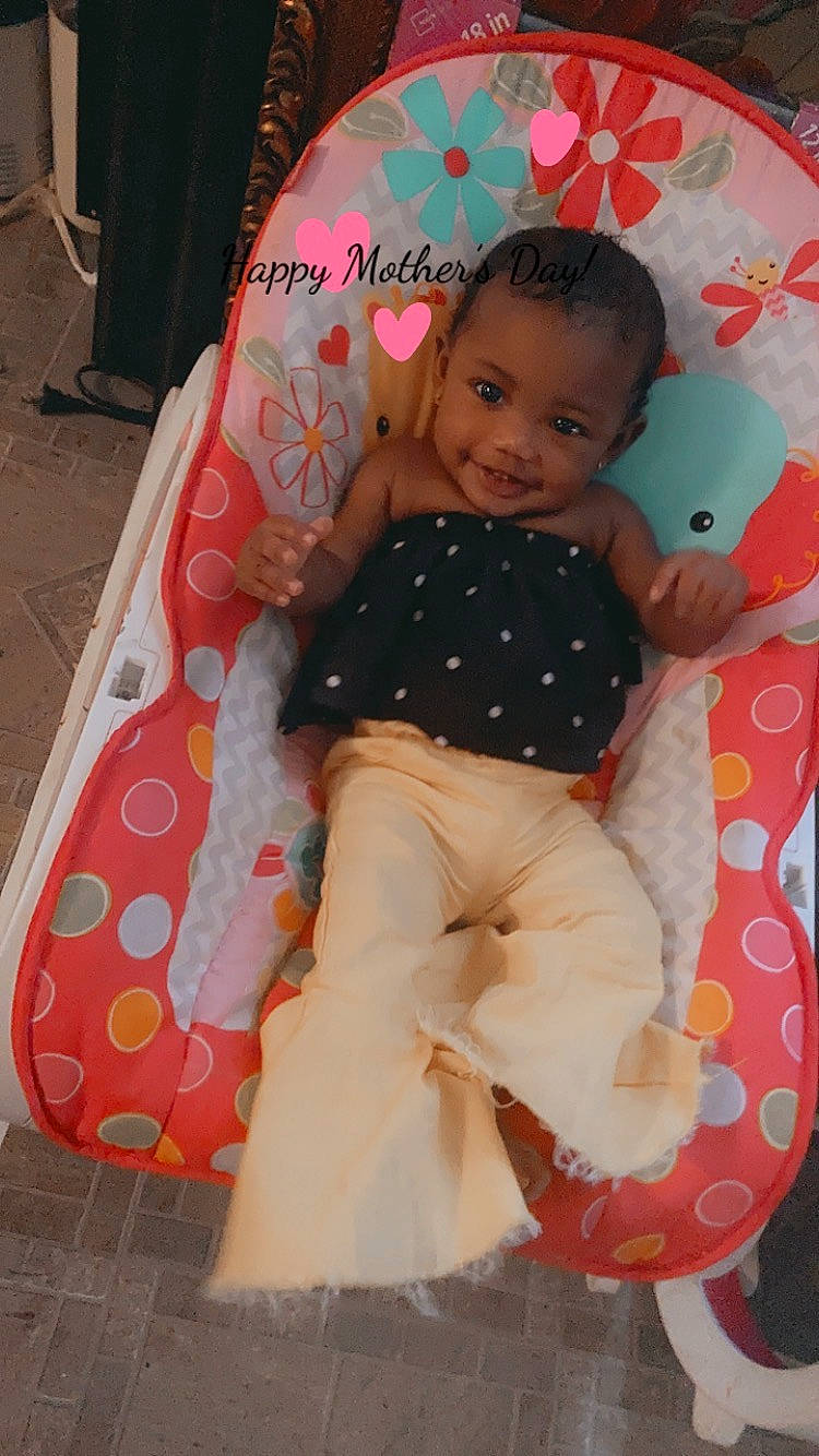 Royalty is registered to the contest to win money with this photo: baby, baby_products, baby_toddler_clothing, child, comfort, fun, hairstyle, happy, head, joy, linens, magenta, pattern, person, pink, play, sitting, sleeve, smile, textile