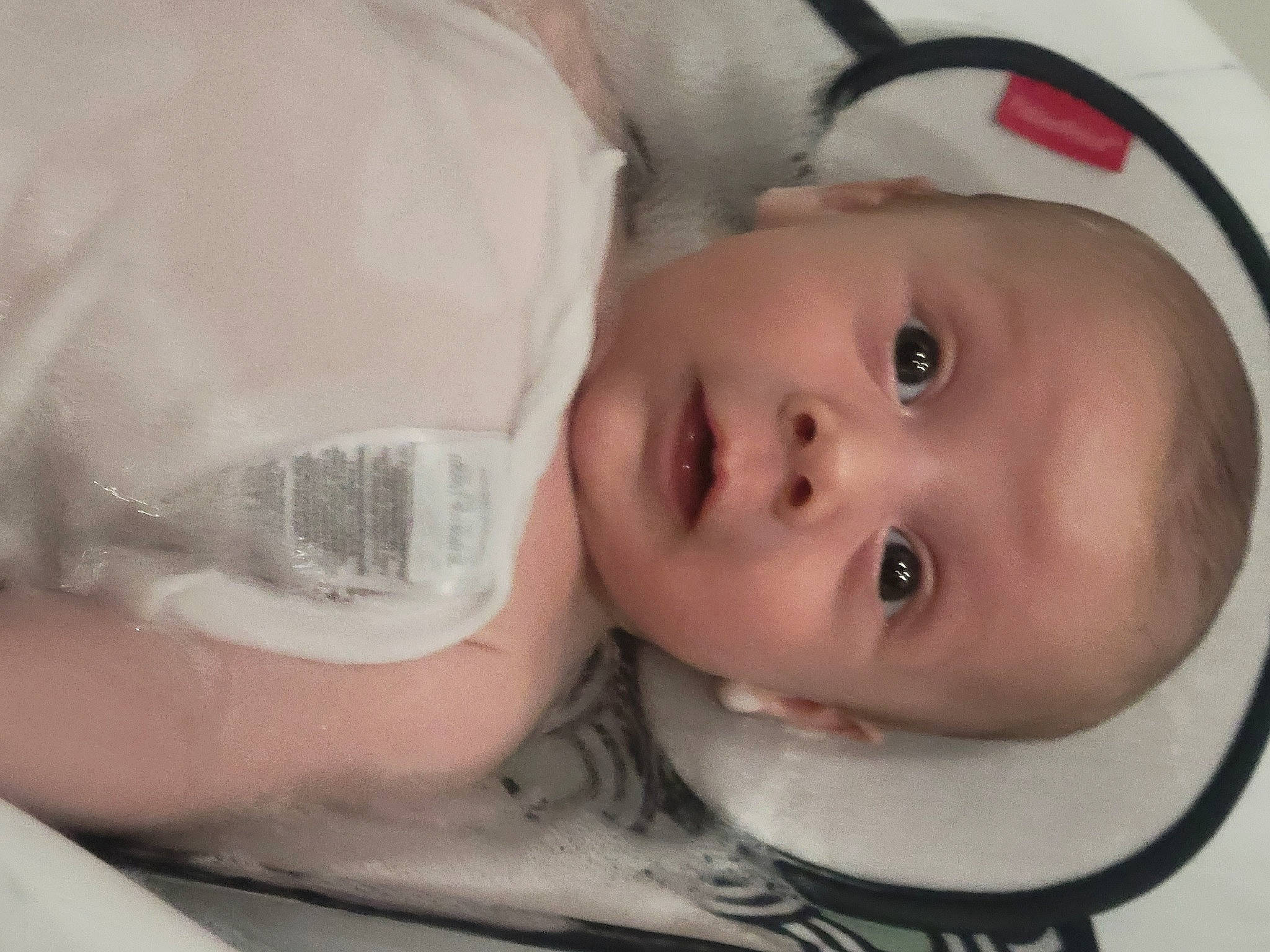 Dennis is registered to the contest to win money with this photo: baby, baby_toddler_clothing, cheek, chin, ear, eye, eyebrow, eyelash, facial_expression, forehead, hairstyle, headgear, helmet, human_body, iris, lip, mouth, nose, person, skin