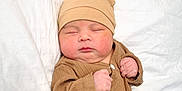 Elizabeth is registered to the contest to win money with this photo: adorable, baby, baby_fashion, brown_clothing, child, closeup, cozy, cute, cute_hat, hat, indoors, infant, newborn, peaceful, portrait, resting, sleep, sleeping, small_hands, soft_blanket