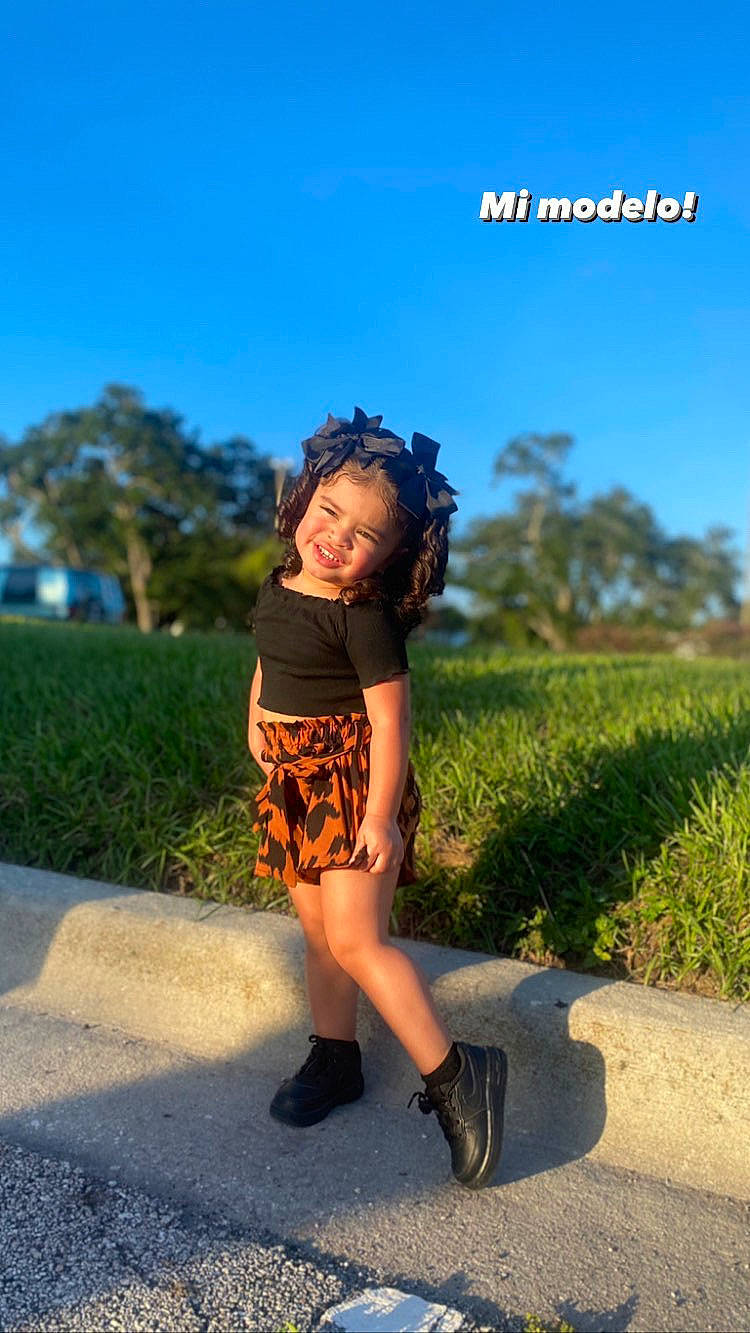 Amalia joined the competition — help win amazing prizes! asphalt, azure, cool, eyewear, flash_photography, fun, grass, grassland, happy, headgear, joy, knee, landscape, leisure, people_in_nature, person, plant, sky, sunlight, thigh