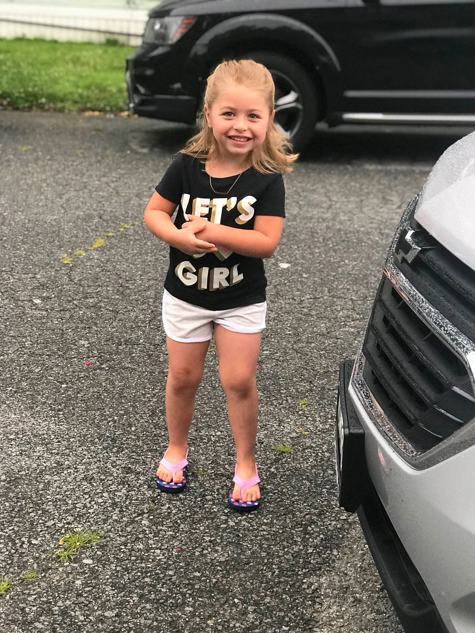 Mackenzie joined the competition — help win amazing prizes! car, crossover_suv, family_car, human_leg, joy, leg, luxury_vehicle, minivan, parking, person, physical_fitness, recreation, running, shorts, smile, style, summer, thigh, vehicle, vehicle_door