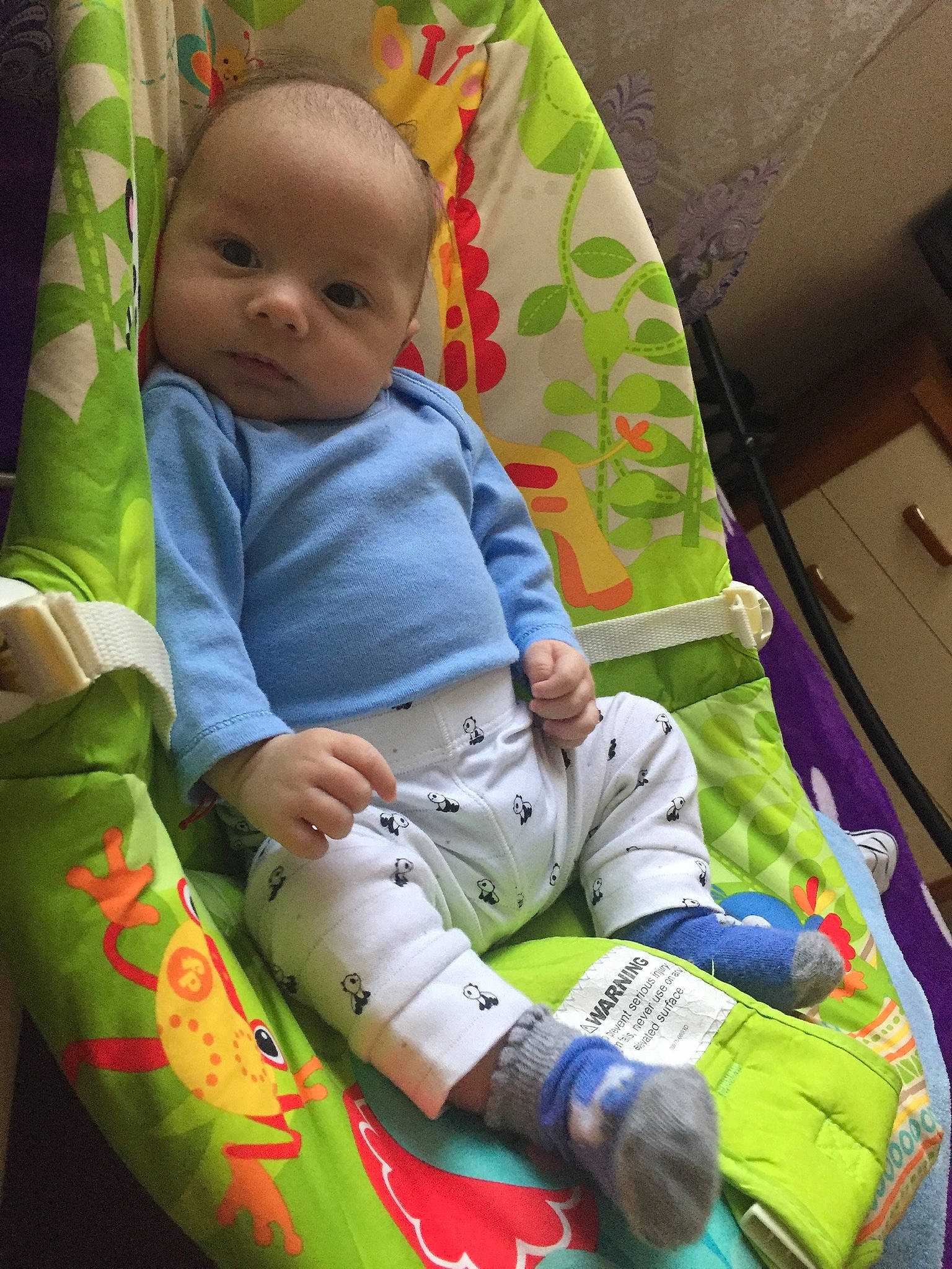 Alexandru is registered to the contest to win money with this photo: baby, baby_in_car_seat, child, person, play, sitting, skin, toddler