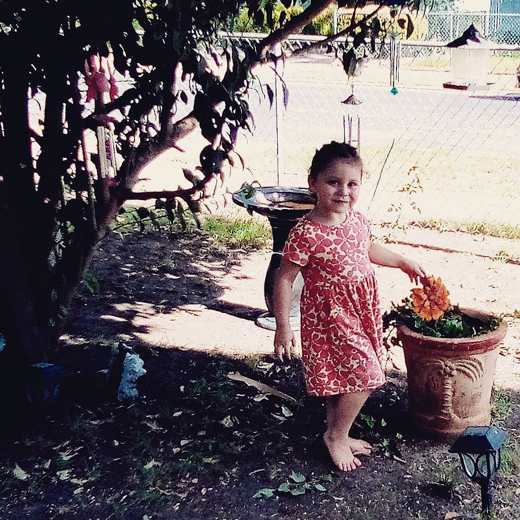 Raelyn joined the competition — help win amazing prizes! adaptation, arecales, botany, child, day_dress, fun, grass, happy, joy, leisure, magenta, people_in_nature, person, plant, sitting, tints_and_shades, toddler, travel, tree, vacation