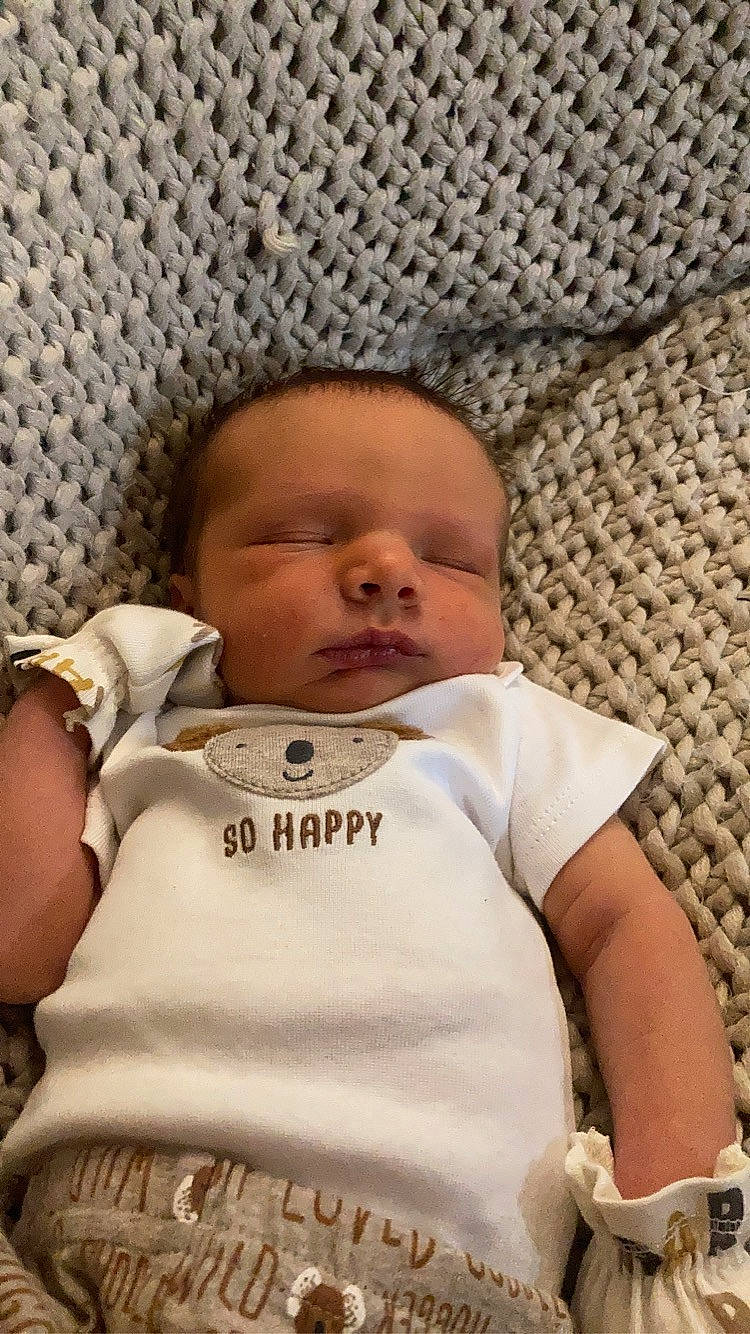 Lane Steele joined the competition — help win amazing prizes! baby, baby_products, baby_toddler_clothing, bib, cheek, child, chin, comfort, eye, happy, head, iris, linens, lip, person, sitting, skin, sleeve, textile, toddler