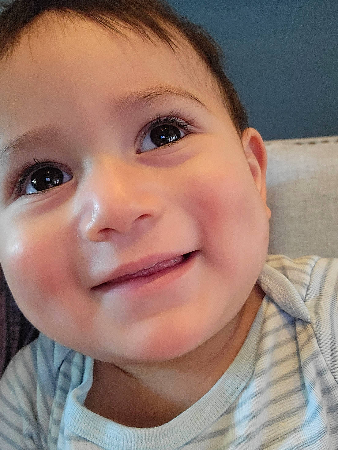 Joaquin is registered to the contest to win money with this photo: baby, baby_toddler_clothing, cheek, chin, ear, eye, eyebrow, eyelash, forehead, happy, iris, jaw, joy, lip, mouth, neck, nose, person, skin, sleeve