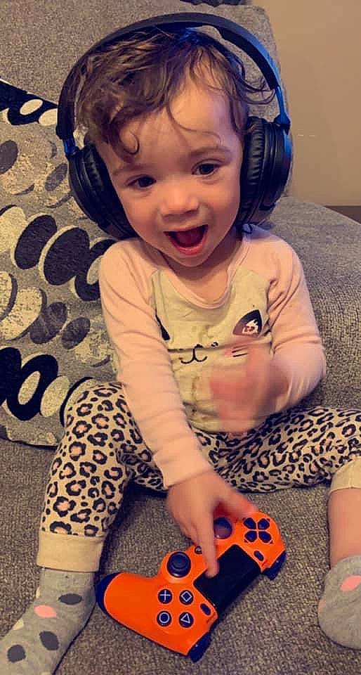 Paizley is registered to the contest to win money with this photo: baby_toddler_clothing, blue, cheek, ear, eye, hairstyle, happy, human_body, iris, mammal, mouth, neck, nose, person, photograph, pink, product, skin, sleeve, smile