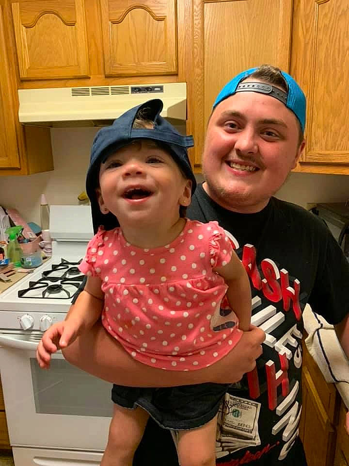 Paizley is registered to the contest to win money with this photo: baseball_cap, cabinetry, cap, child, cooking, countertop, event, fun, hairstyle, happy, headwear, home_appliance, joy, kitchen, kitchen_appliance, leisure, pattern, person, room, shorts