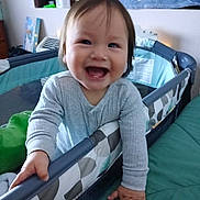 Vance joined the competition — help win amazing prizes! baby, blanket, child, clothing, cozy, cute, face, furniture, hands, happy, home, indoor, infant, person, playpen, room, smiling, soft_lighting, toddler, toy