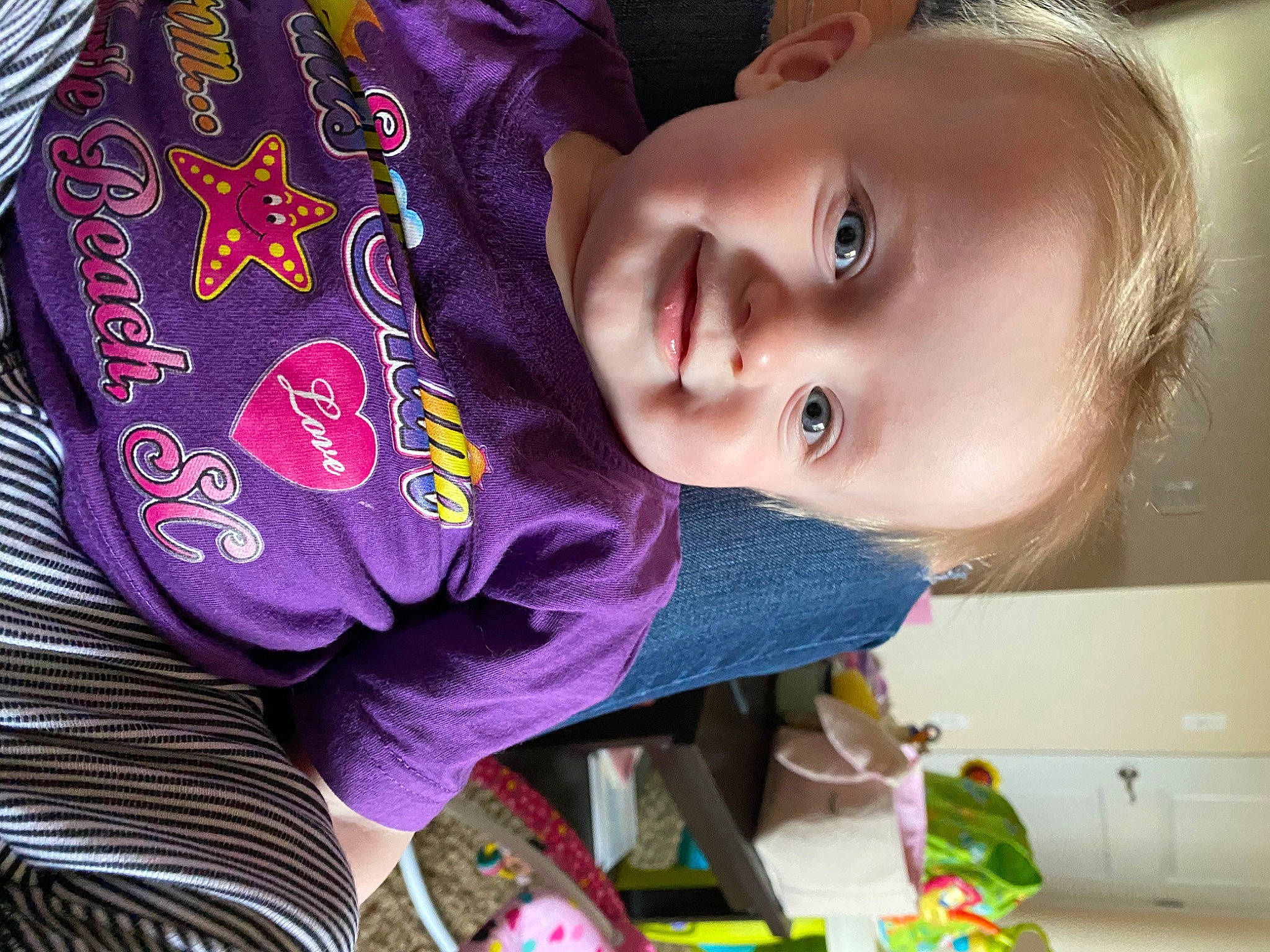 Arabella is registered to the contest to win money with this photo: cheek, child, cool, eye, joy, lip, nose, person, purple, smile, toddler