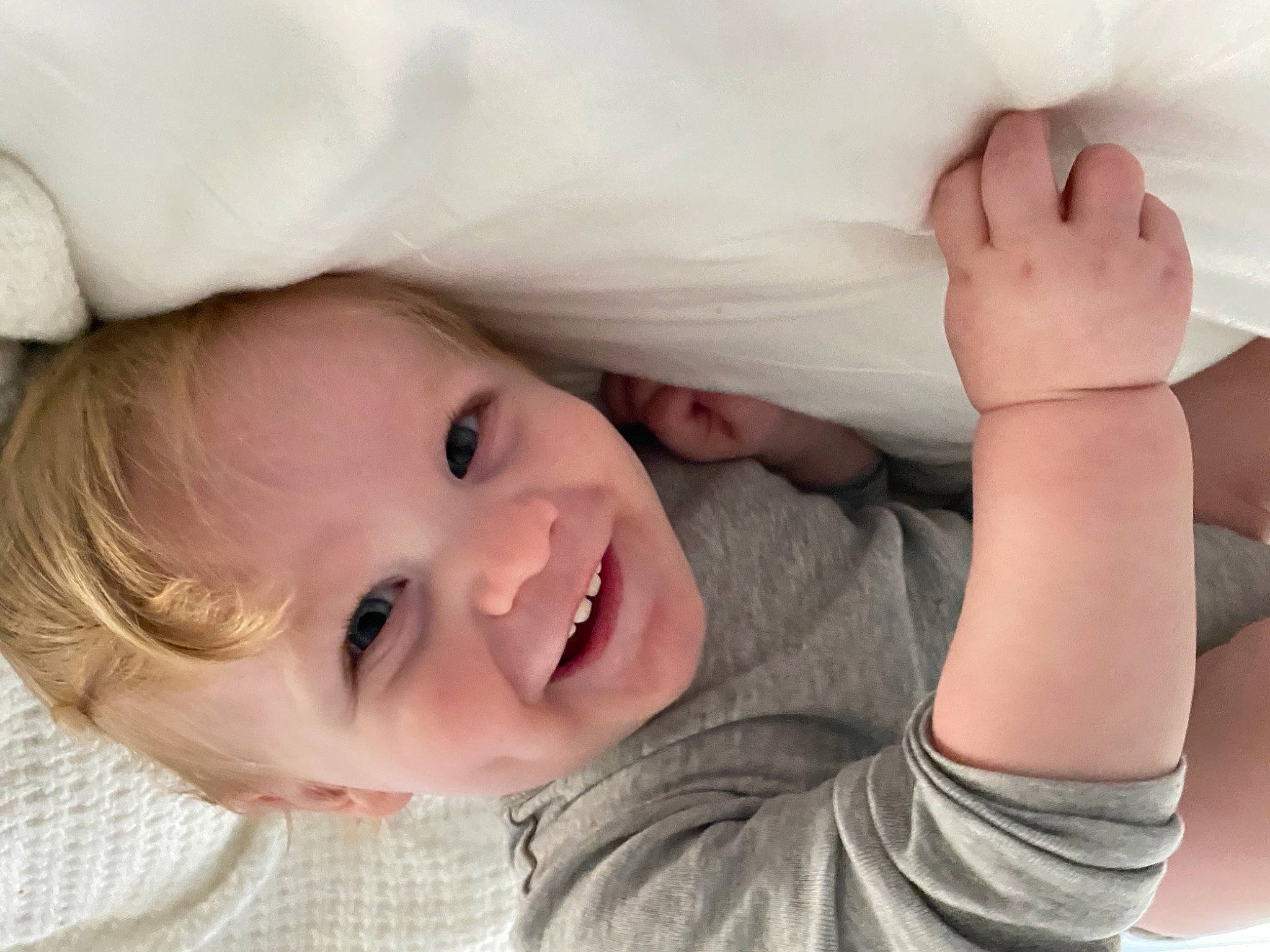 John is registered to the contest to win money with this photo: arm, cheek, clothing, comfort, eye, eyebrow, face, facial_expression, gesture, hand, happy, head, iris, joy, lip, nose, organ, person, photograph, plant