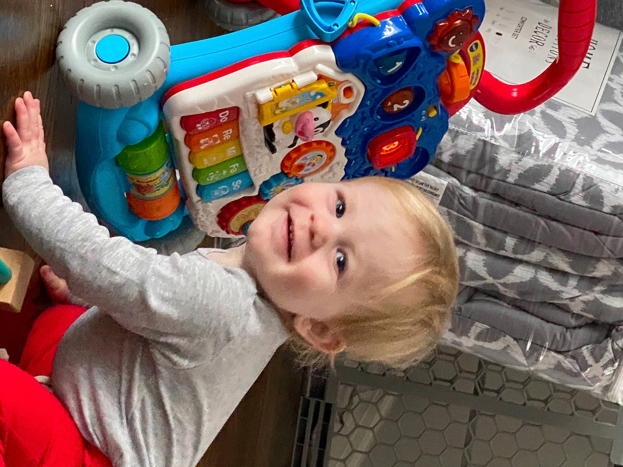 John joined the competition — help win amazing prizes! baby, baby_laughing, baby_playing_with_toys, baby_products, baby_toddler_clothing, baby_toys, child, facial_expression, fun, happy, joy, laugh, leisure, person, plastic, play, room, smile, textile, toddler