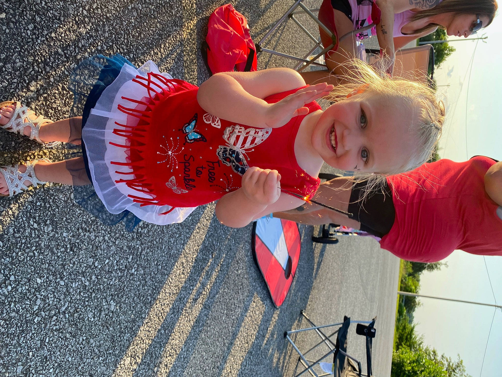 Ariel is registered to the contest to win money with this photo: baby, baby_toddler_clothing, carmine, child, event, fun, happy, hat, human_leg, joy, leisure, person, pink, plant, recreation, red, smile, thigh, toddler