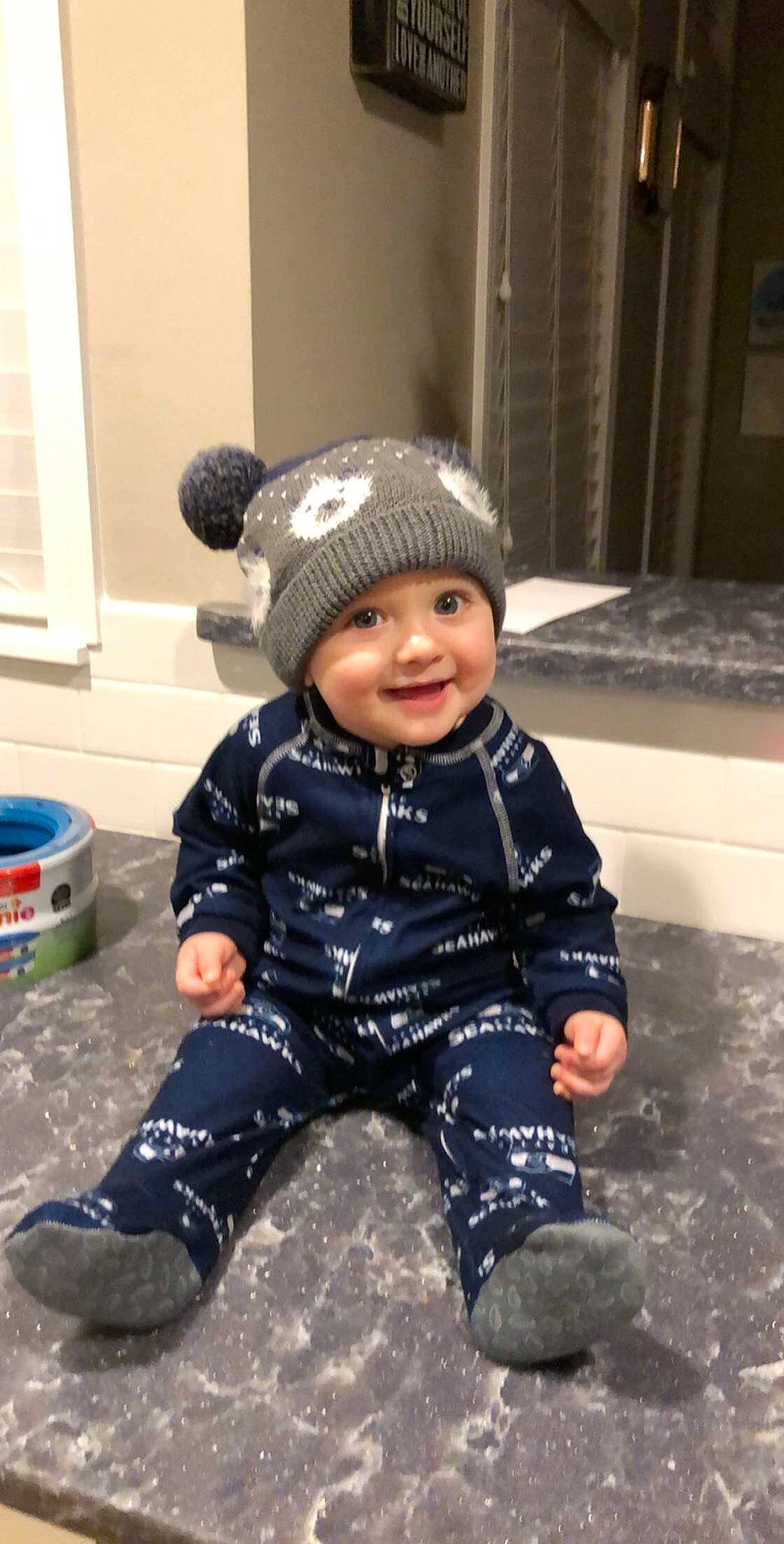 Cohen is registered to the contest to win money with this photo: baby, beanie, bonnet, cap, child, cool, headgear, headwear, joy, knit_cap, male, outerwear, person, play, sleeve, toddler