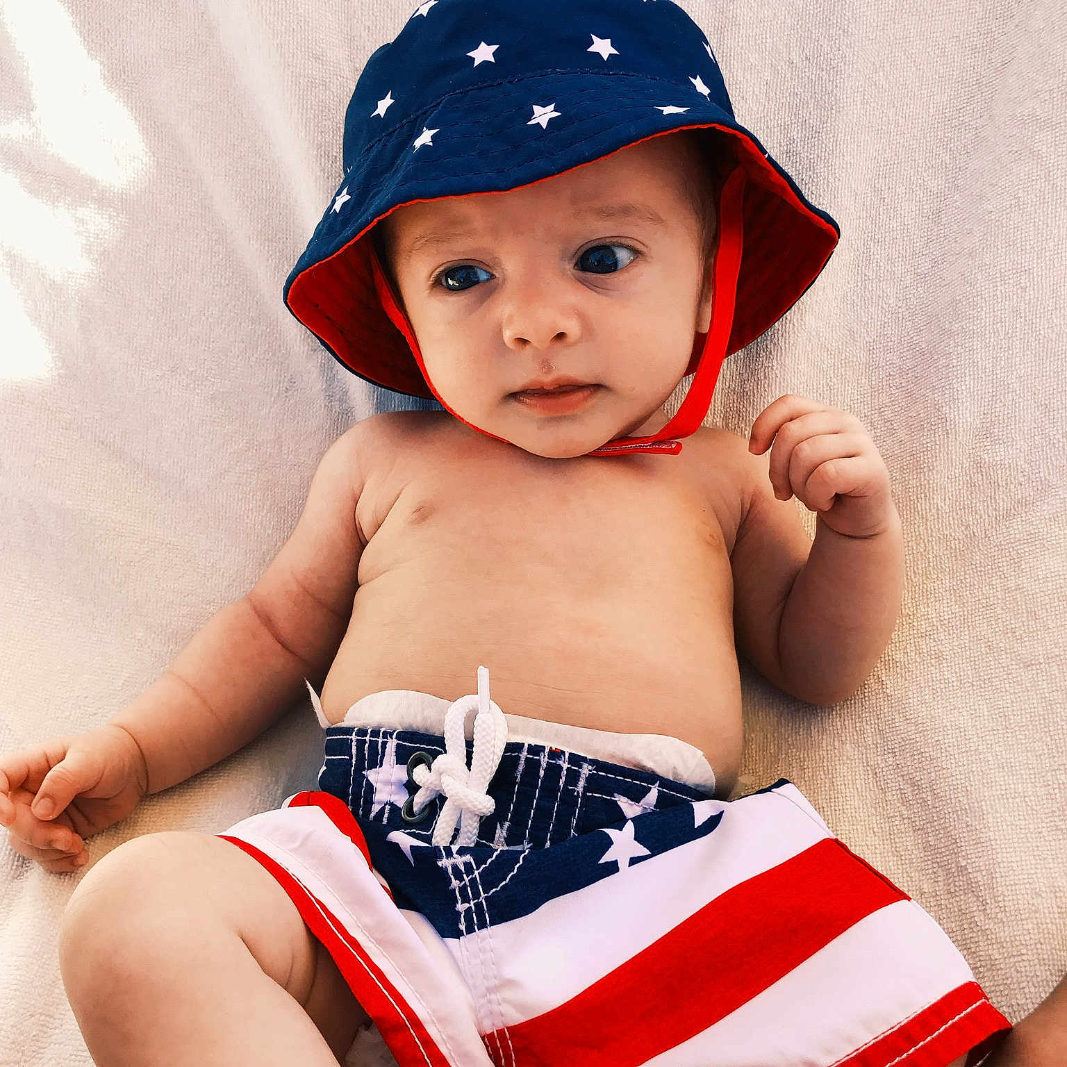 Cohen is registered to the contest to win money with this photo: baby, baby_bloomers, black_hair, briefs, cap, child, child_model, clothing, costume, costume_accessory, costume_hat, fashion_accessory, hat, headgear, headwear, leg, muscle, person, personal_protective_equipment, thigh