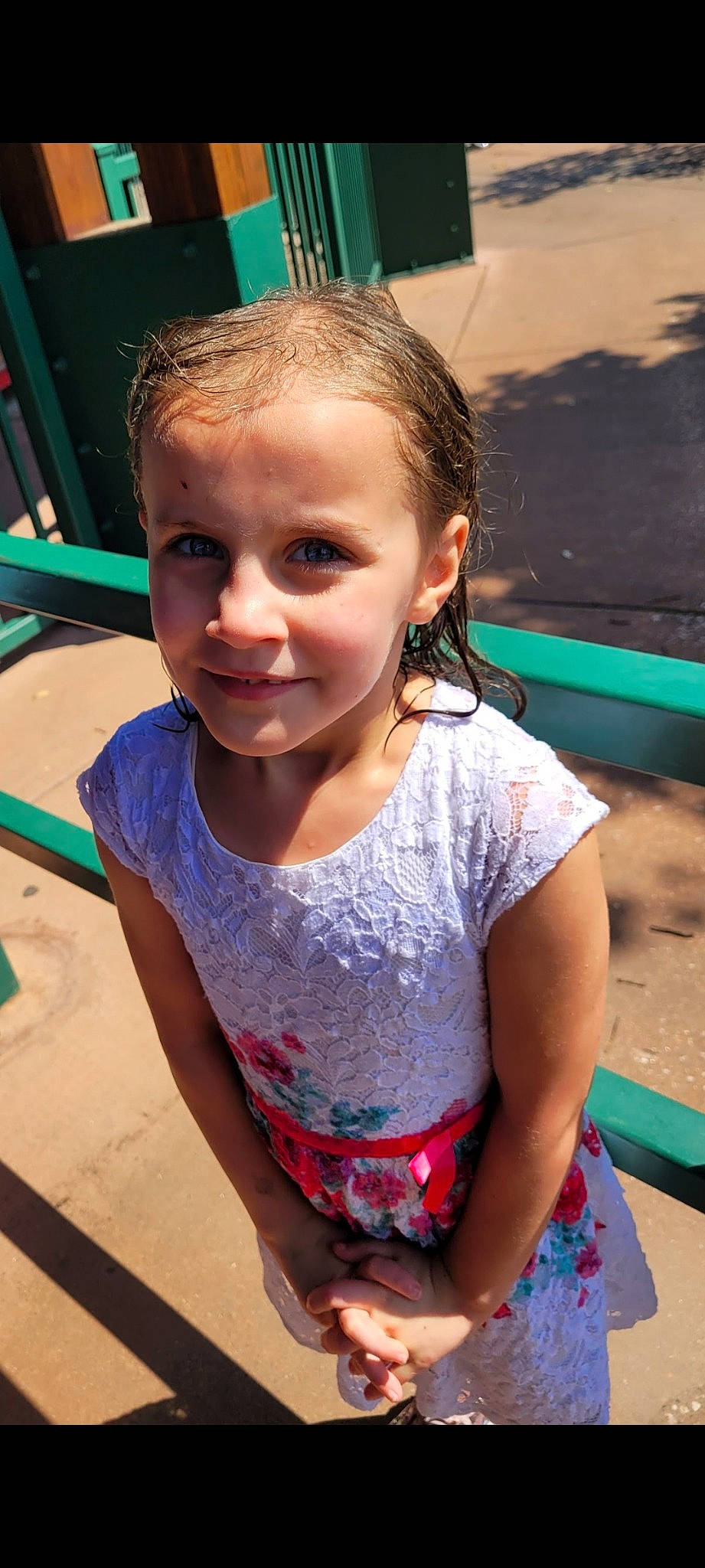 Thea is registered to the contest to win money with this photo: blue, chin, cool, facial_expression, grass, hair, hairstyle, happy, head, human_body, iris, joy, leisure, mouth, neck, person, public_space, recreation, skin, smile