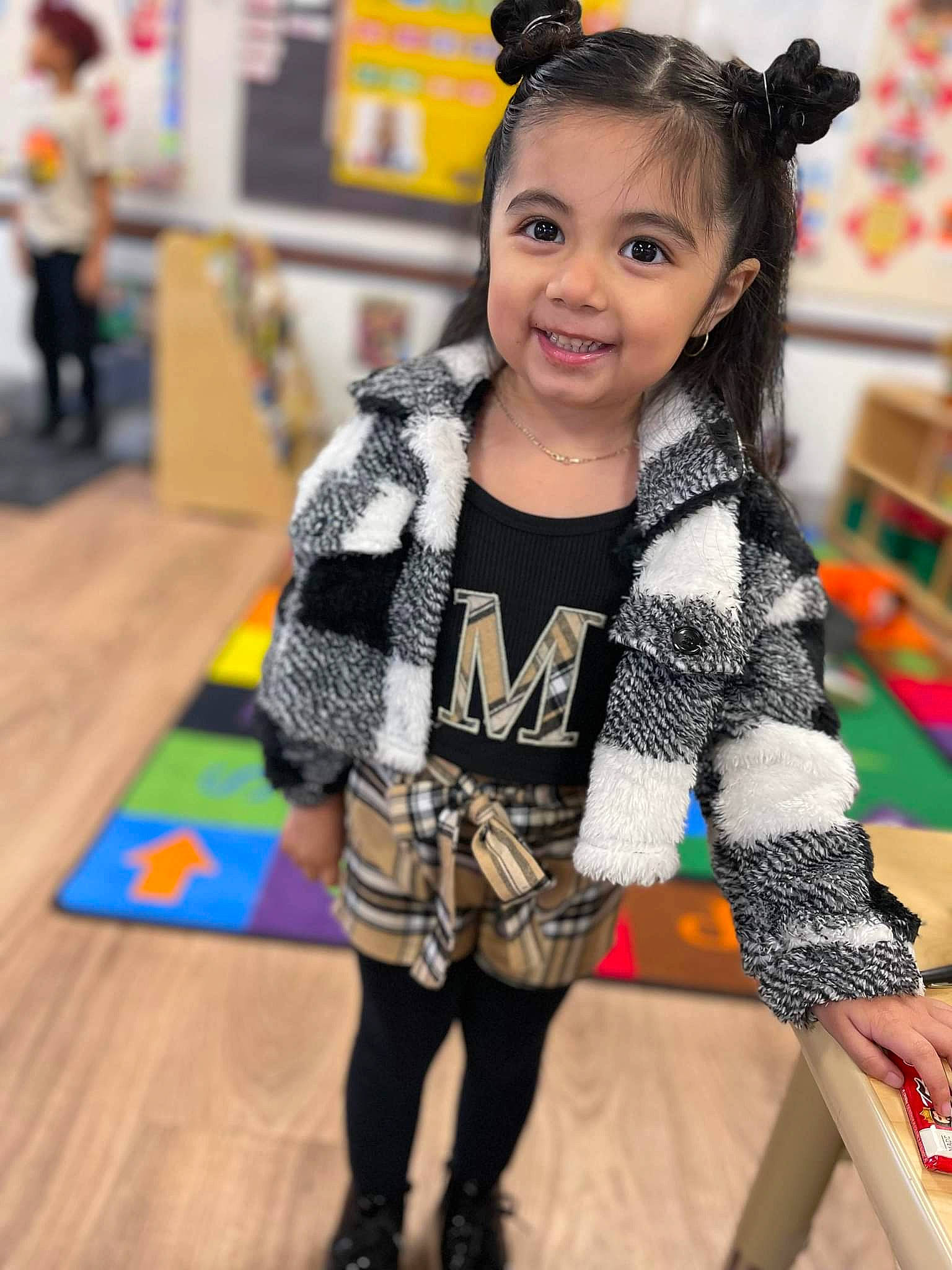 Melanie joined the competition — help win amazing prizes! brown_hair, child, design, event, fashion, fashion_accessory, fashion_design, flooring, fun, happy, joy, leisure, long_hair, pattern, person, plaid, skin, sleeve, smile, textile