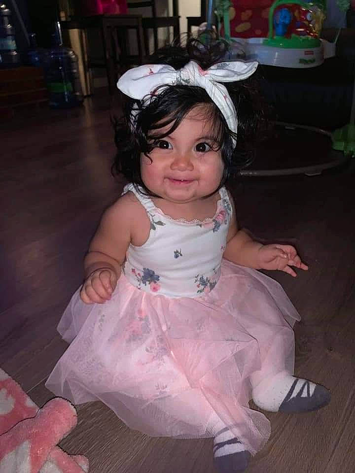 Melanie joined the competition — help win amazing prizes! baby_toddler_clothing, chair, child, dress, event, fashion_accessory, flooring, fun, happy, headpiece, iris, joy, mythical_creature, person, pink, purple, sitting, skin, smile, textile