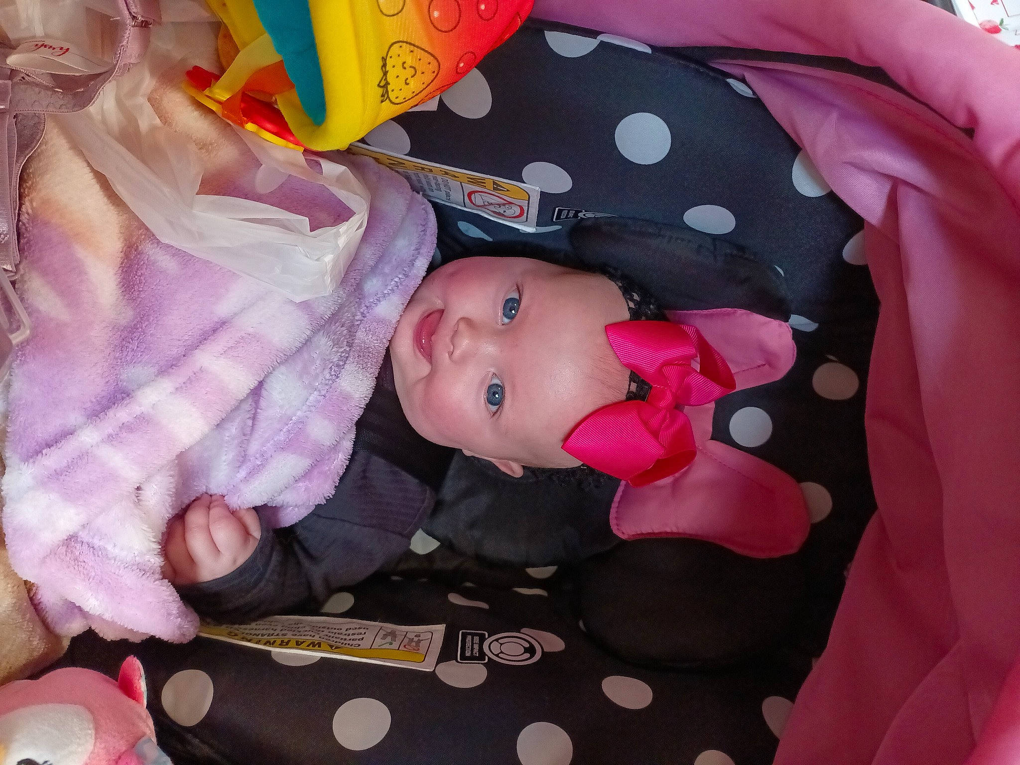 Fallon joined the competition — help win amazing prizes! baby, baby_carriage, baby_products, baby_toddler_clothing, baby_toys, cheek, child, comfort, headwear, magenta, pattern, person, pink, room, skin, sleeve, textile, toddler, toy