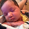 Kyleigh joined the competition — help win amazing prizes! baby, sleeping, blanket, hand, face, infant, cozy, soft, carpet, person, skin, resting, home, indoors, peaceful, cute, newborn, portrait, relaxed, child