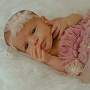 Avery joined the competition — help win amazing prizes! newborn, baby, infant, pink_blanket, headband, pearls, white_lace, soft_texture, lying_down, portrait, cute, small_hands, delicate, peaceful, cozy, sleepy, closeup, baby_clothing, resting, indoors