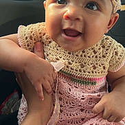 Teyani joined the competition — help win amazing prizes! baby, child, smiling, headband, crocheted_dress, cute, infant, hand, car_interior, seat, person, happy, portrait, young_child, clothing, sitting, skin, face, cute_expression, toddler