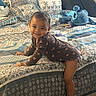 Teyani joined the competition — help win amazing prizes! toddler, child, baby, bed, bedding, blanket, plush_toy, stuffed_animal, stitch, smile, happy, indoor, room, foot, clothing, pattern, fabric, person, furniture, cute