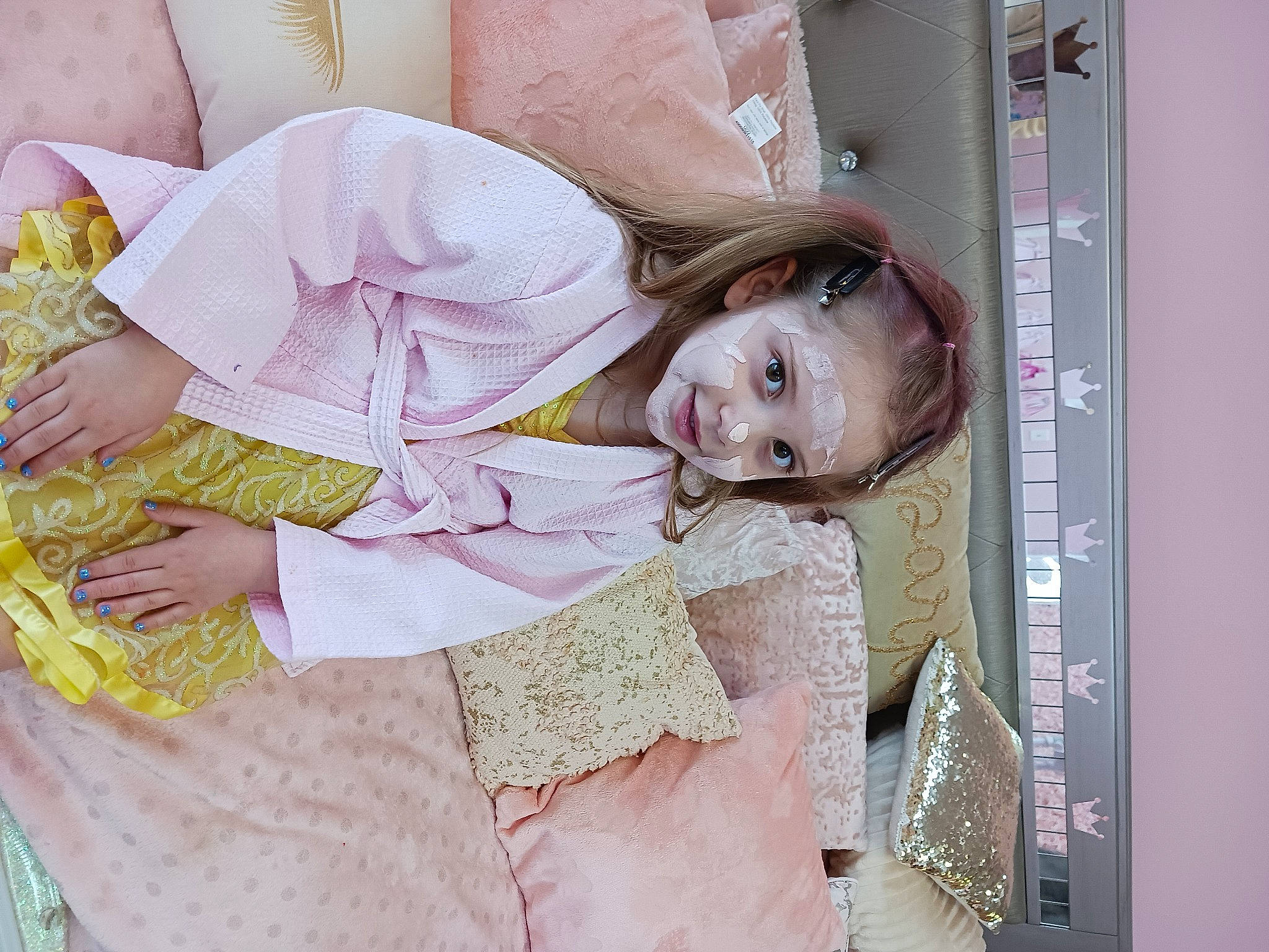 Lila is registered to the contest to win money with this photo: baby_products, child, comfort, eyelash, fashion_design, happy, human_body, linens, magenta, necklace, pattern, peach, person, pink, room, skin, sleeve, smile, vintage_clothing
