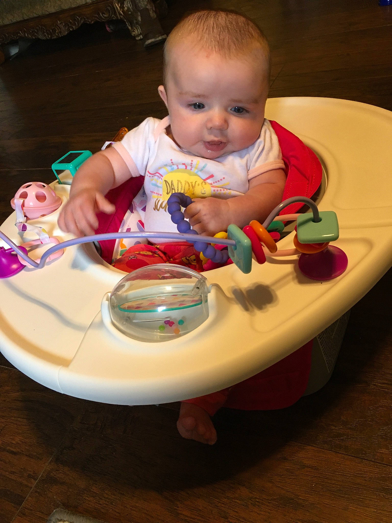Loretta is registered to the contest to win money with this photo: baby, baby_food, child, eating, food, fun, person, play, product, sitting, toddler, toy