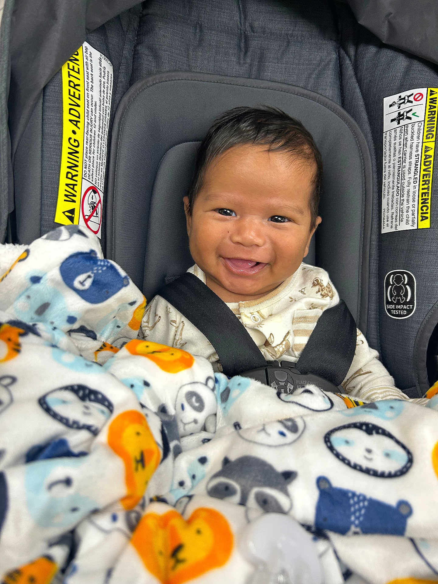 Noah Davon joined the competition — help win amazing prizes! baby, blanket, car, car_interior, carseat, crib, cushion, face, furniture, happy, head, homedecor, infantbed, laughing, person, photography, portrait, smile, transportation, vehicle