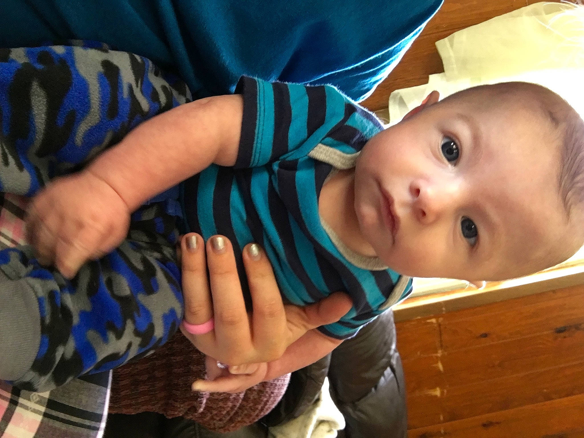 Landon is registered to the contest to win money with this photo: arm, baby, baby_products, cheek, child, eye, finger, gesture, hand, mouth, nose, person, skin, smile, thumb, toddler