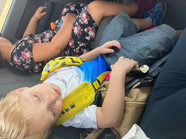 Sebastian is registered to the contest to win money with this photo: abdomen, arm, comfort, elbow, finger, fun, hand, human_leg, joint, knee, lap, leg, leisure, nail, person, room, shorts, sitting, thigh, trunk