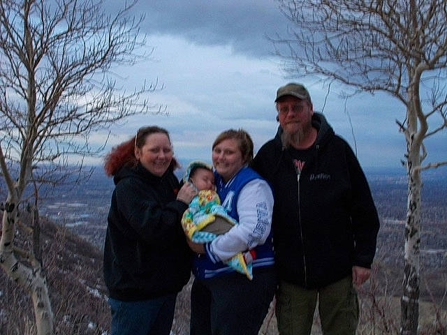 Nicolas is registered to the contest to win money with this photo: baby, blurred, cloud, event, fun, grass, grassland, happy, headwear, hill, jacket, joy, landscape, leisure, person, recreation, sky, smile, toddler, travel