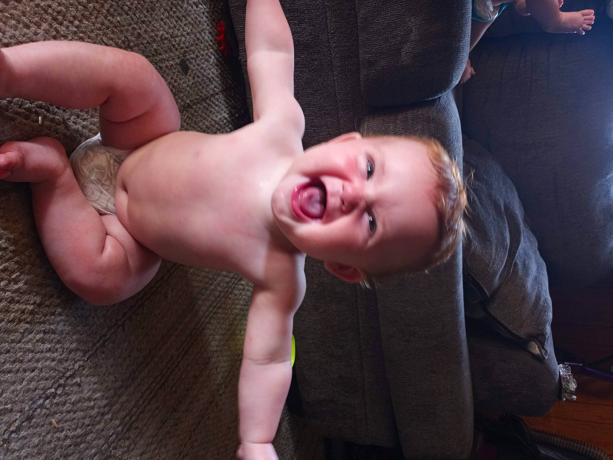 Steven is registered to the contest to win money with this photo: abdomen, barechested, barefoot, black_hair, chest, elbow, event, flash_photography, gesture, glasses, happy, human_leg, knee, neck, person, smile, sunglasses, thigh, tree, trunk