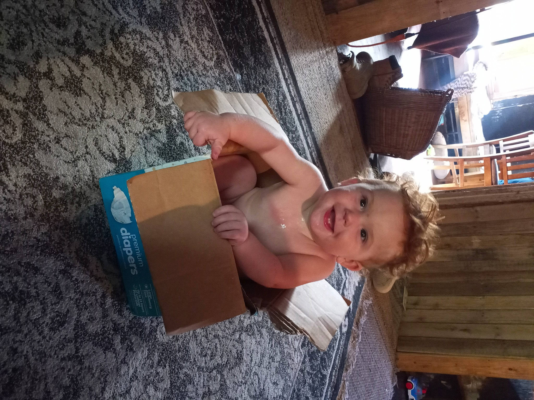 Steven joined the competition — help win amazing prizes! baby, box, cardboard, child, eyewear, fun, happy, house, human_leg, joy, landscape, leisure, paper_product, person, room, shipping_box, sitting, smile, thigh, toddler