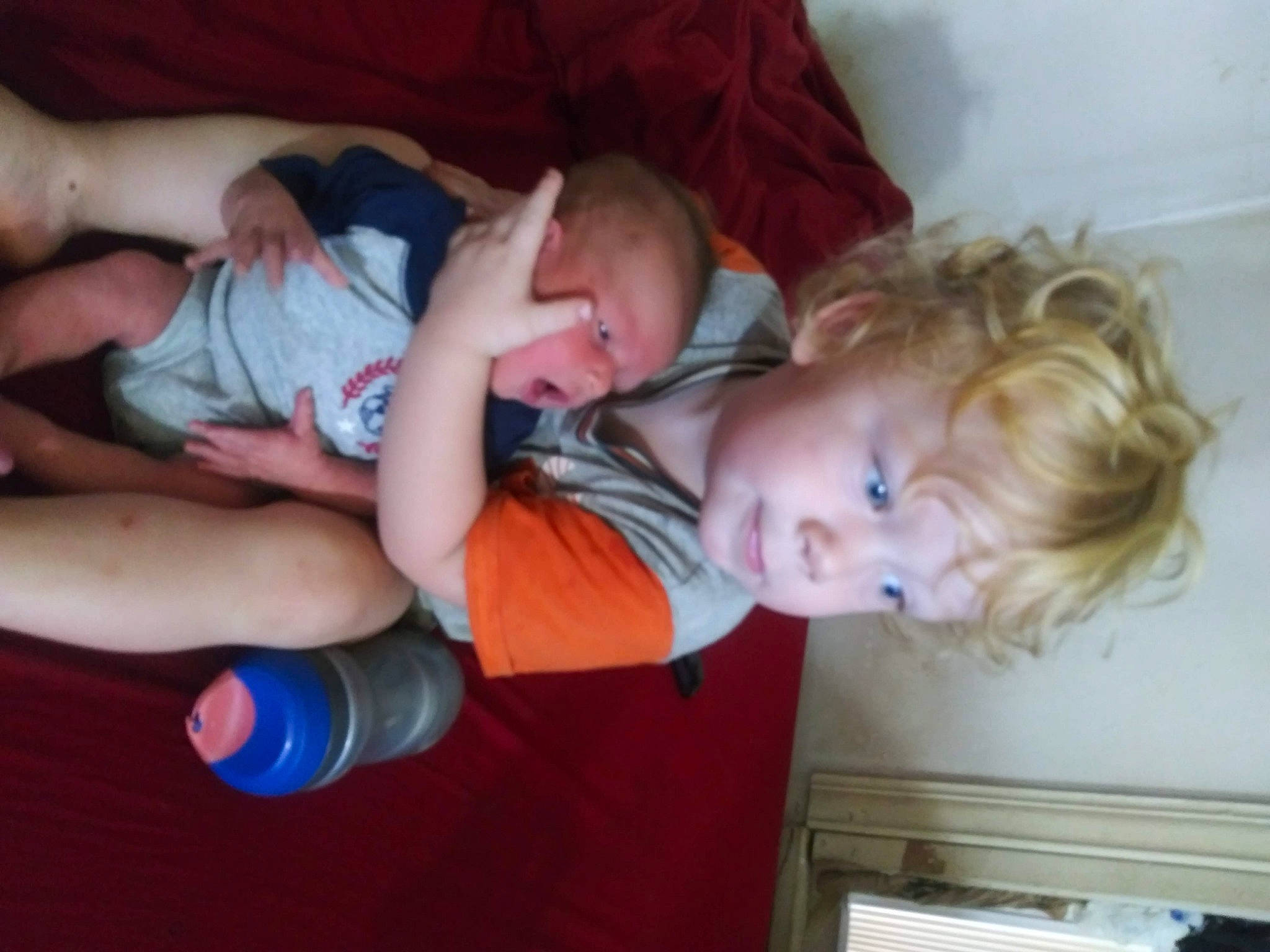 Jamie is registered to the contest to win money with this photo: arm, baby, baby_toddler_clothing, cheek, child, comfort, elbow, fun, iris, joint, mouth, nose, people, person, room, sitting, t_shirt, thigh, thumb, toddler