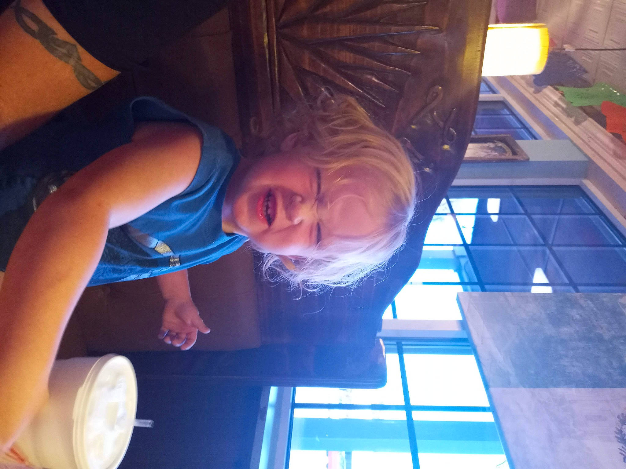 Jamie is registered to the contest to win money with this photo: automotive_lighting, azure, chair, child, cool, elbow, electric_blue, fun, happy, leisure, light, mouth, night, person, room, sky, smile, tree, vacation, vehicle_door