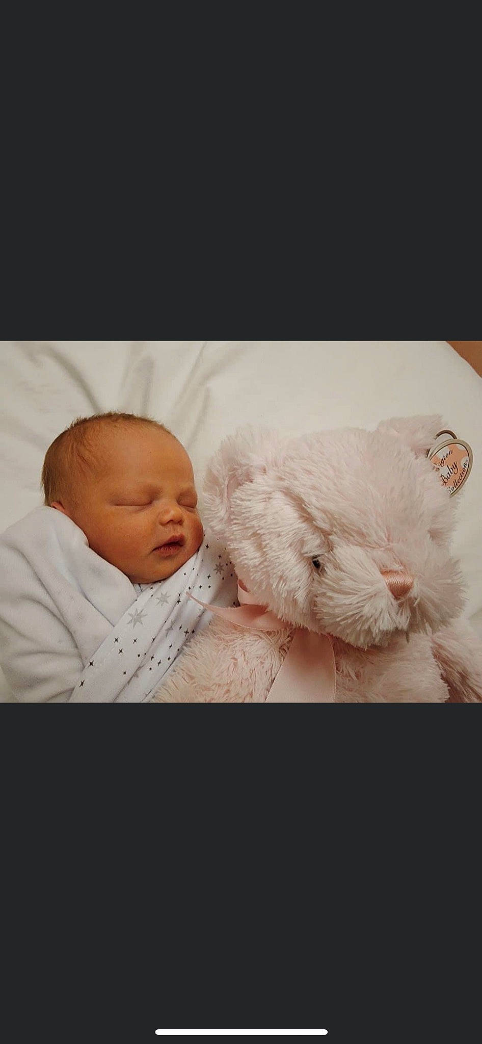 Lennon is registered to the contest to win money with this photo: baby, baby_products, baby_sleeping, baby_toddler_clothing, bedding, bedtime, child, cloud, comfort, fur, happy, headgear, knit_cap, linens, love, nap, nose, person, skin, toddler