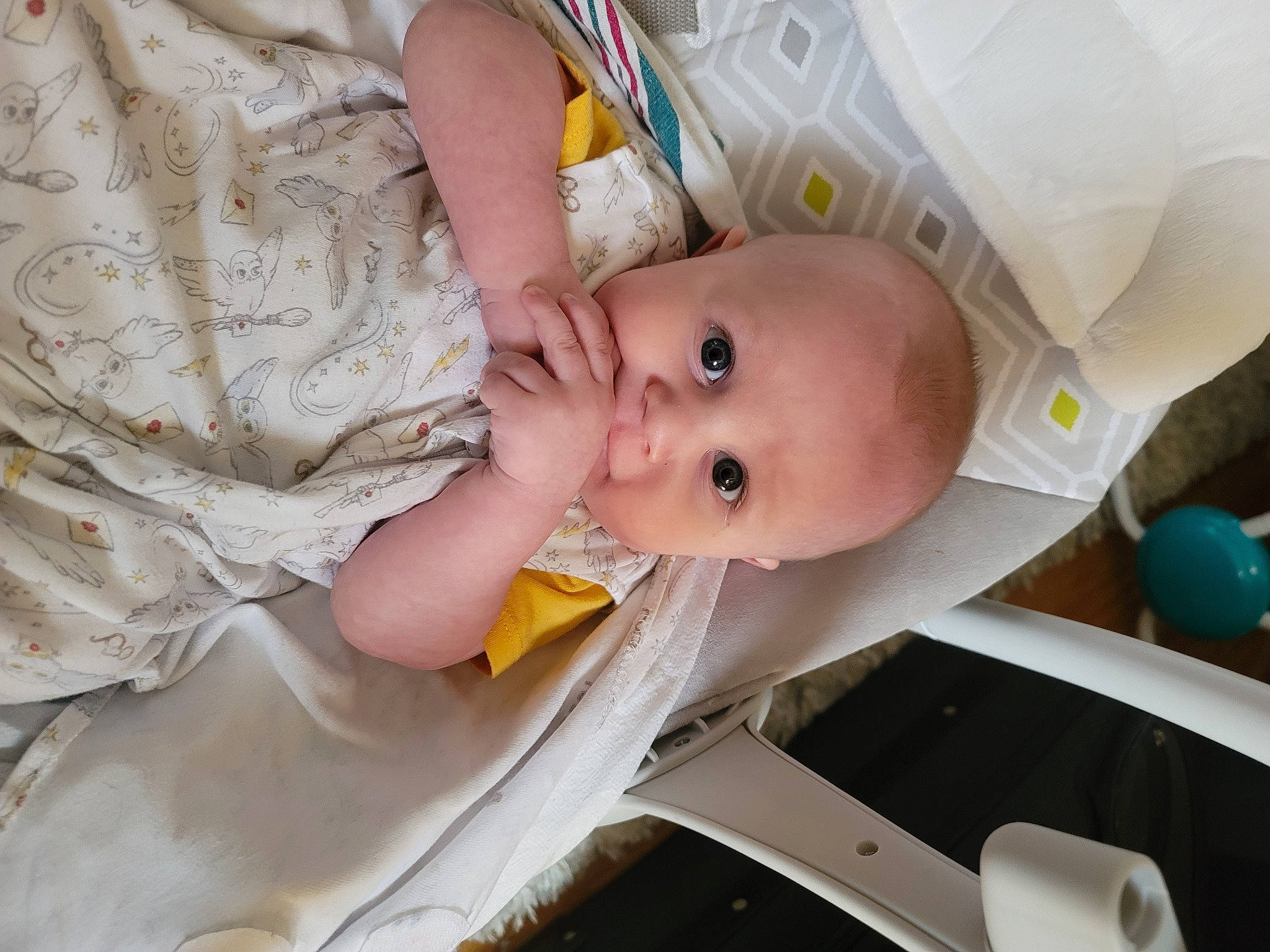 Desmond is registered to the contest to win money with this photo: baby, baby_products, baby_safety, baby_toddler_clothing, child, comfort, dress, happy, human_body, iris, nail, pattern, person, toddler