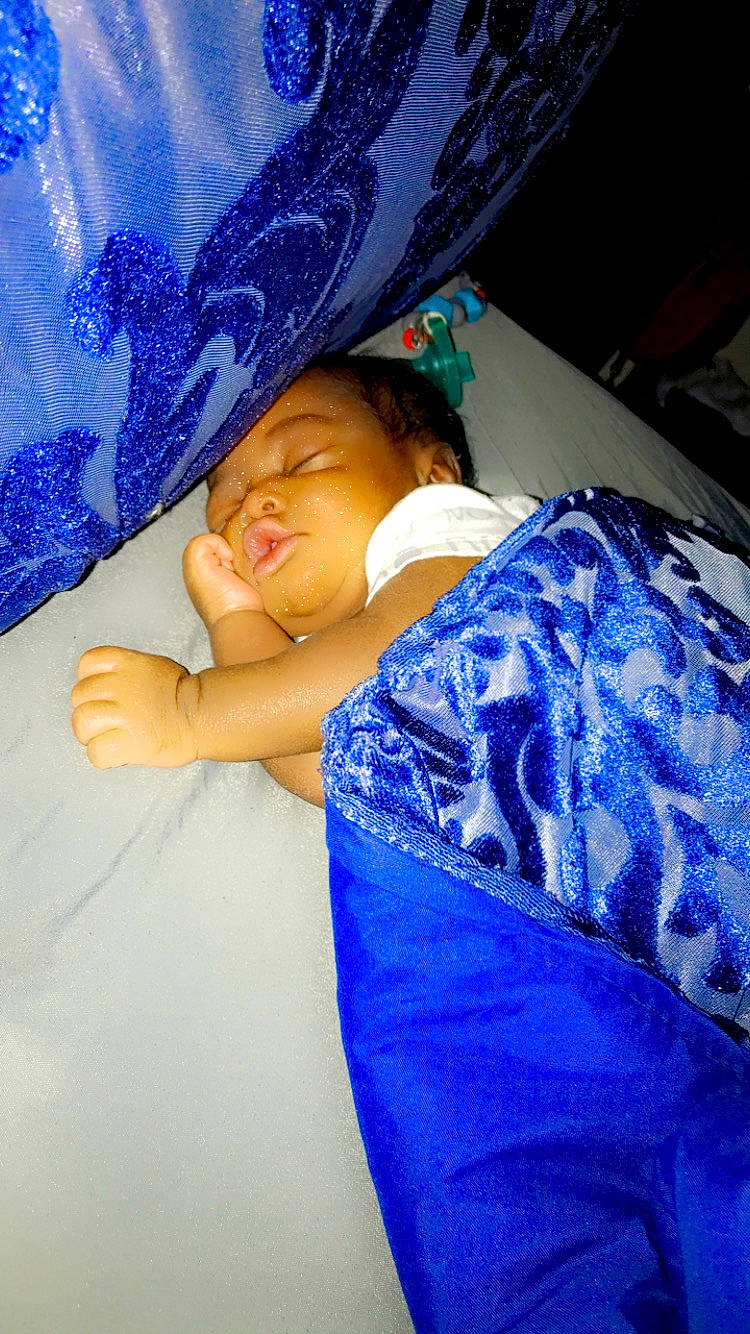 Bryson is registered to the contest to win money with this photo: abdomen, azure, baby, blue, child, comfort, elbow, electric_blue, event, fun, happy, linens, magenta, nap, pattern, person, purple, t_shirt, textile, toddler