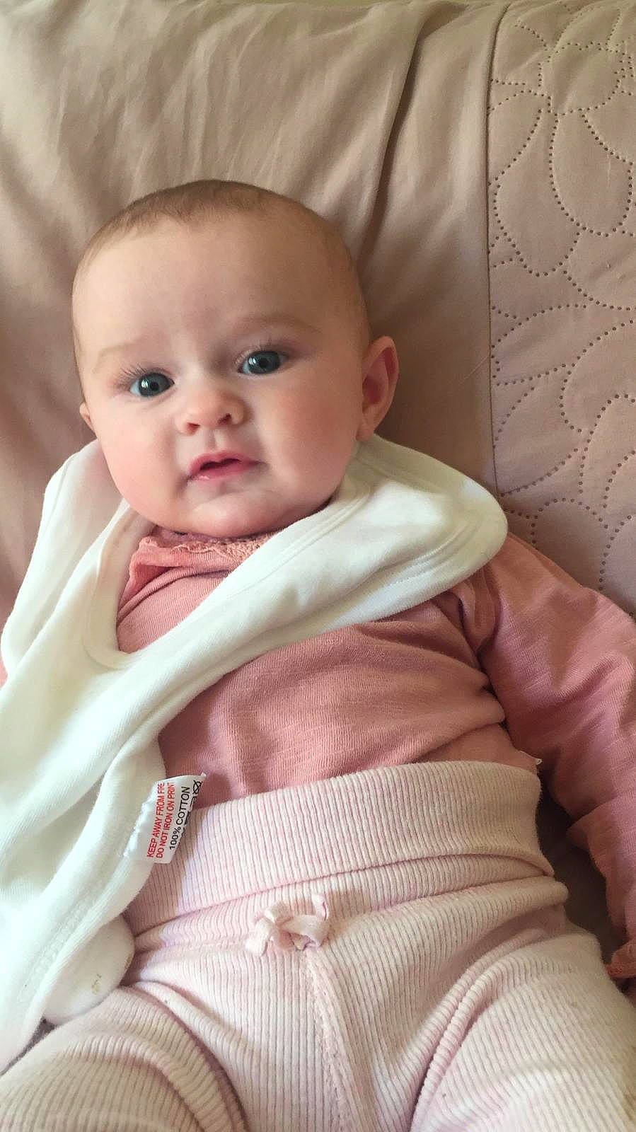 Ava-mae is registered to the contest to win money with this photo: baby, baby_products, cheek, child, eye, face, head, iris, lip, nose, person, pink, product, skin, smile, toddler