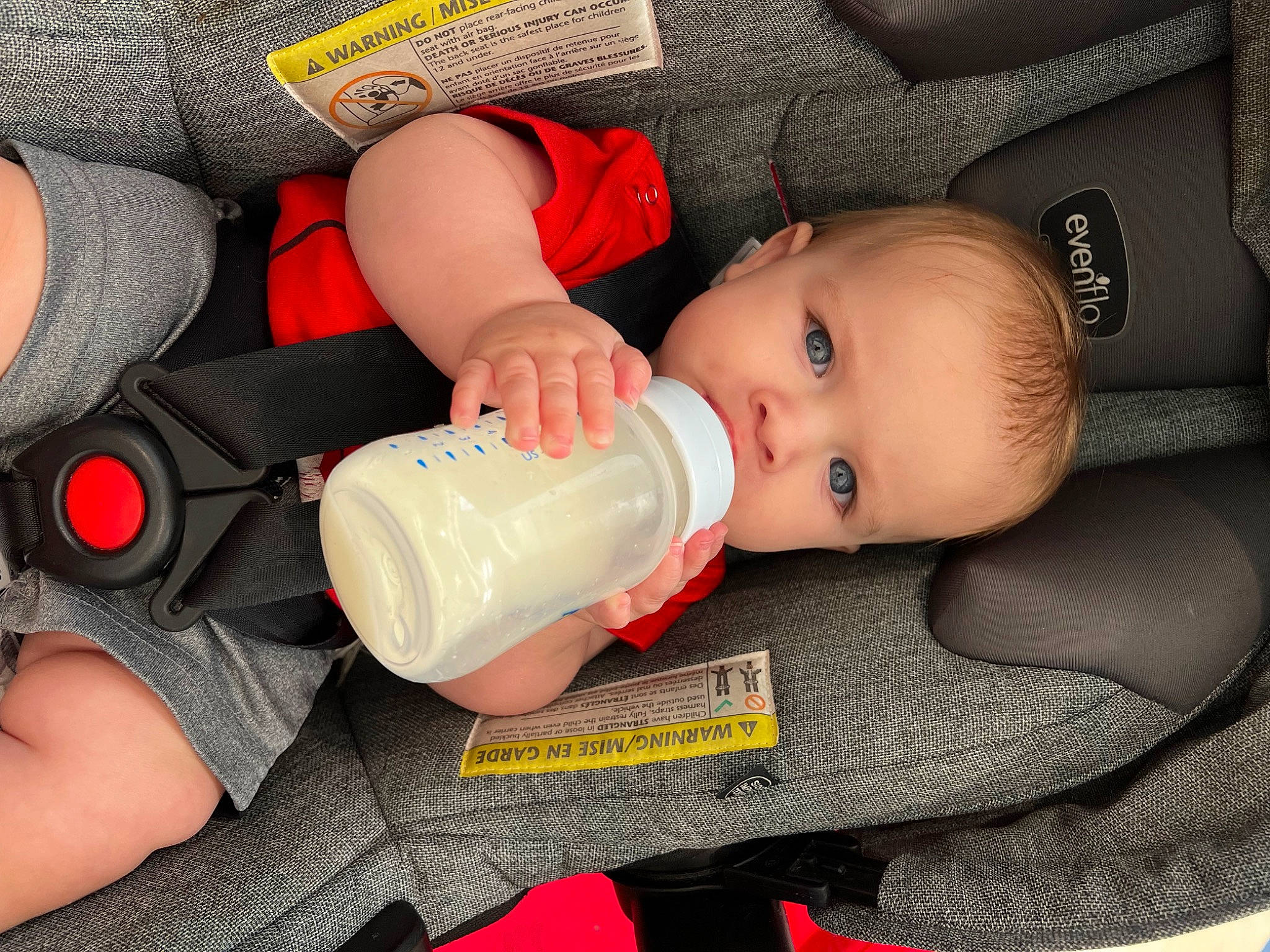 Cody is registered to the contest to win money with this photo: baby, baby_bottle, baby_products, baby_toddler_clothing, bottle, cheek, child, drinking, drinkware, finger, gesture, hand, human_body, human_leg, mouth, nail, person, plastic_bottle, skin, thumb