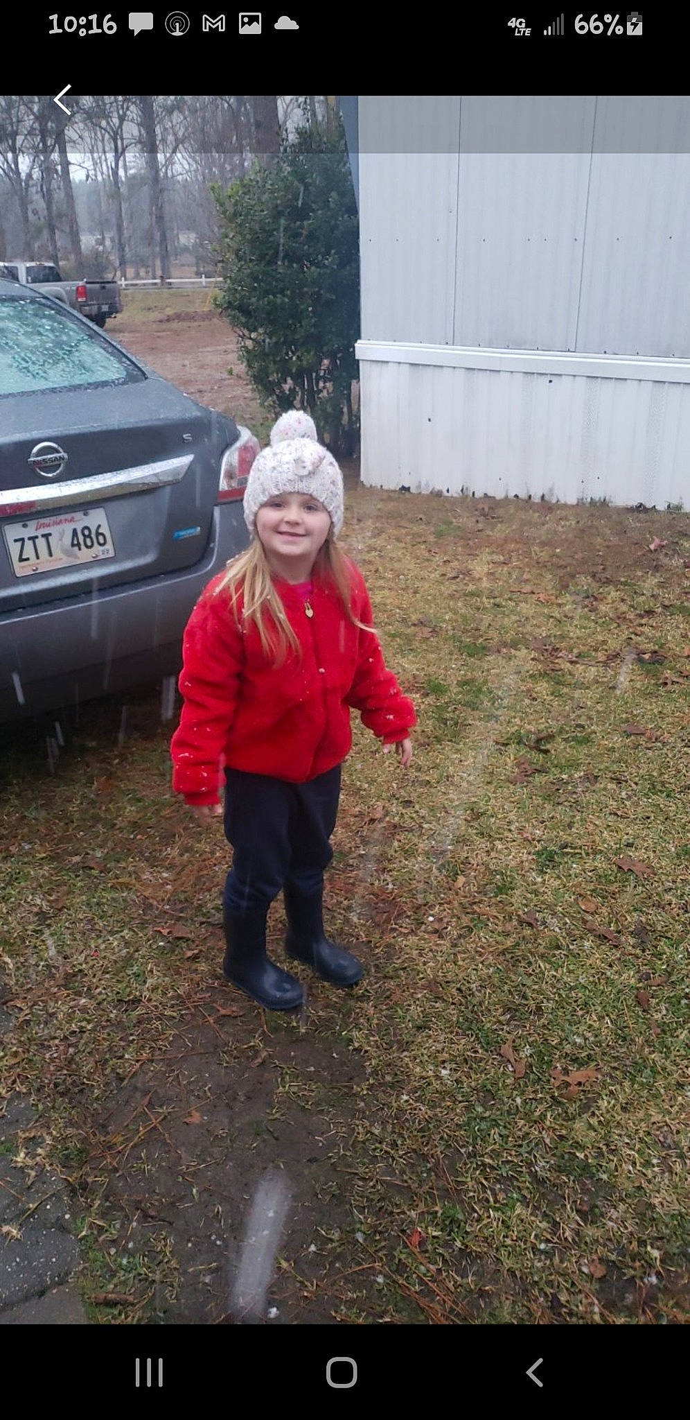 Allie joined the competition — help win amazing prizes! asphalt, automotive_design, automotive_exterior, automotive_lighting, automotive_tire, bumper, car, fender, grass, headwear, jacket, jeans, joy, motor_vehicle, person, plant, smile, tire, tree, vehicle