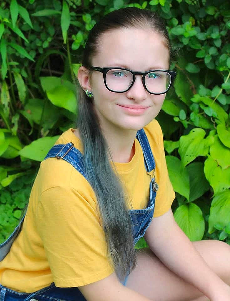 Bindi joined the competition — help win amazing prizes! clothing, eye, eyewear, face, flash_photography, glasses, grass, green, happy, joy, lip, neck, people_in_nature, person, plant, shoulder, skin, sleeve, smile, sunlight